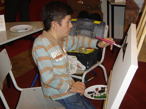 Nem a doena impede Cludio de pintar
