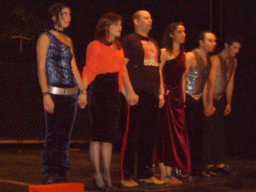 Actores no final da peça 
